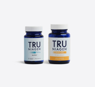Two blue bottles with white labels, one labeled TRU NIAGEN IMMUNE and the other TRU NIAGEN 300mg, against a white background.